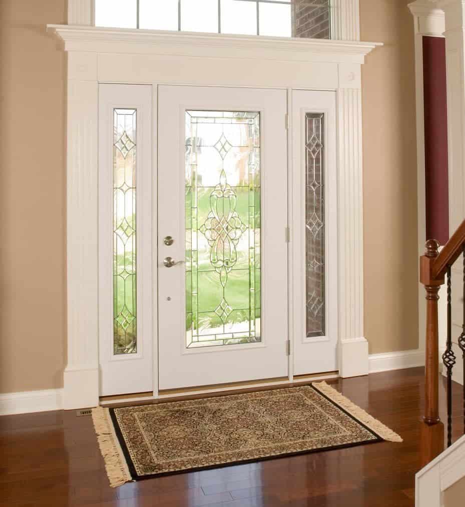 white entry door with transom and side lites