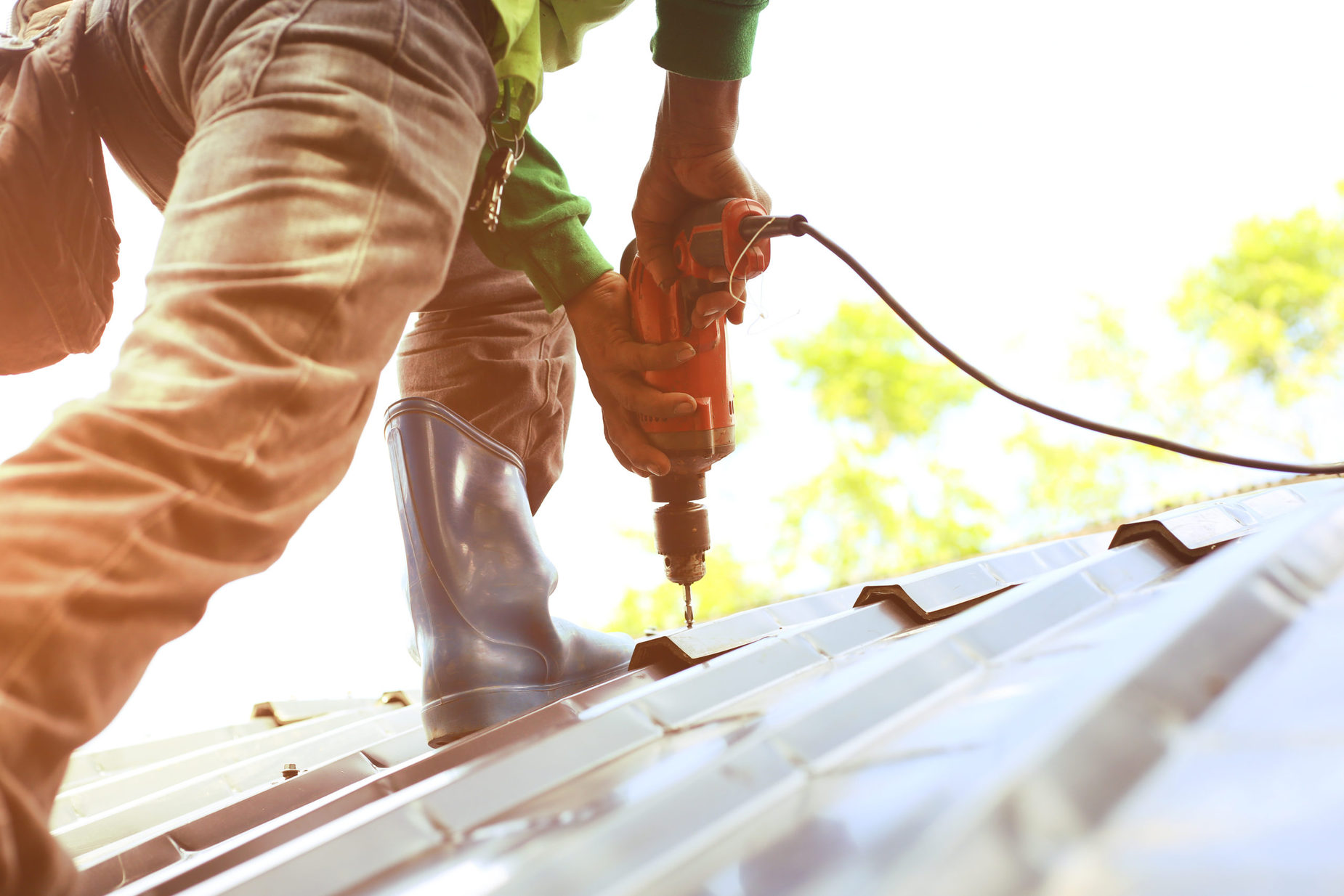 Technician replacing roof