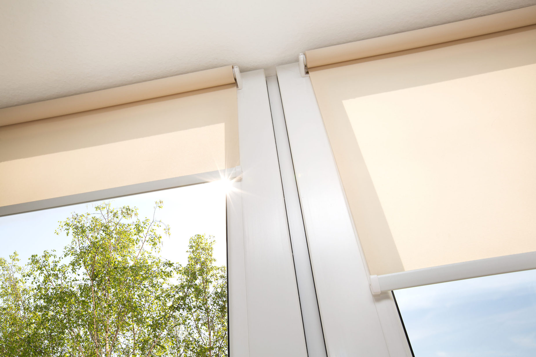 shades on window with sunlight