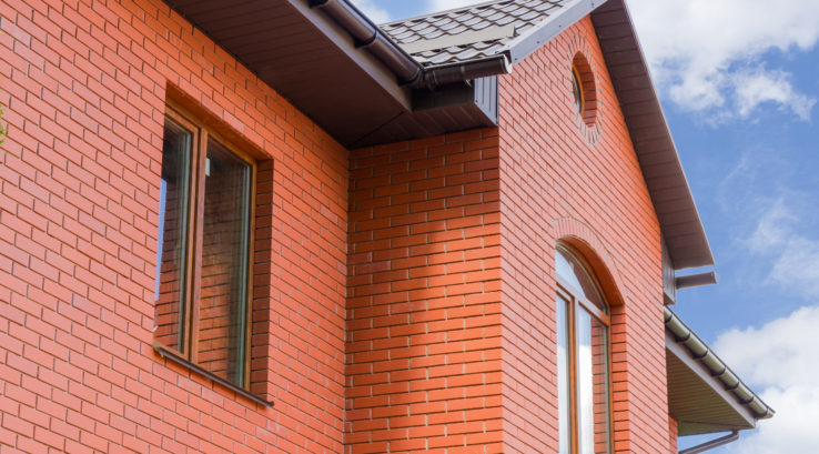 How to Choose a Roof Color for a Red Brick House
